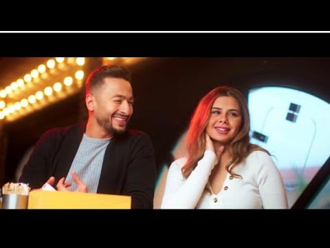 Hamada Helal Gamalha Official Music Video حمادة هلال جمالها الكليب الرسمي مع منة عرفة